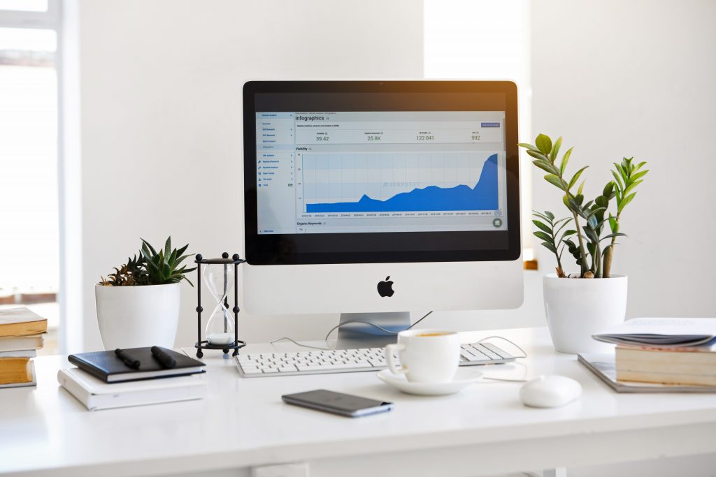 White apple products on a white desk clear and crisp
