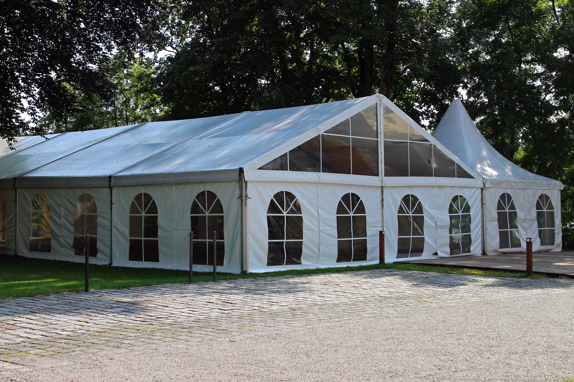 White marquee with lots of windows for a party